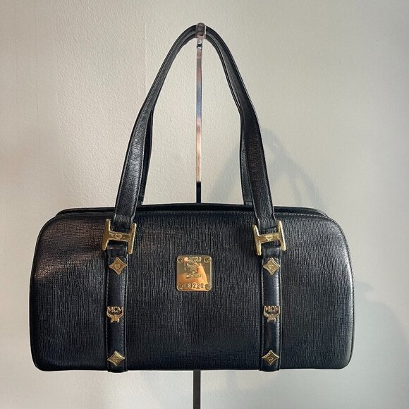 MCM Handbags - MCM  Calfskin Studded Barrel Bag Black - Preowned